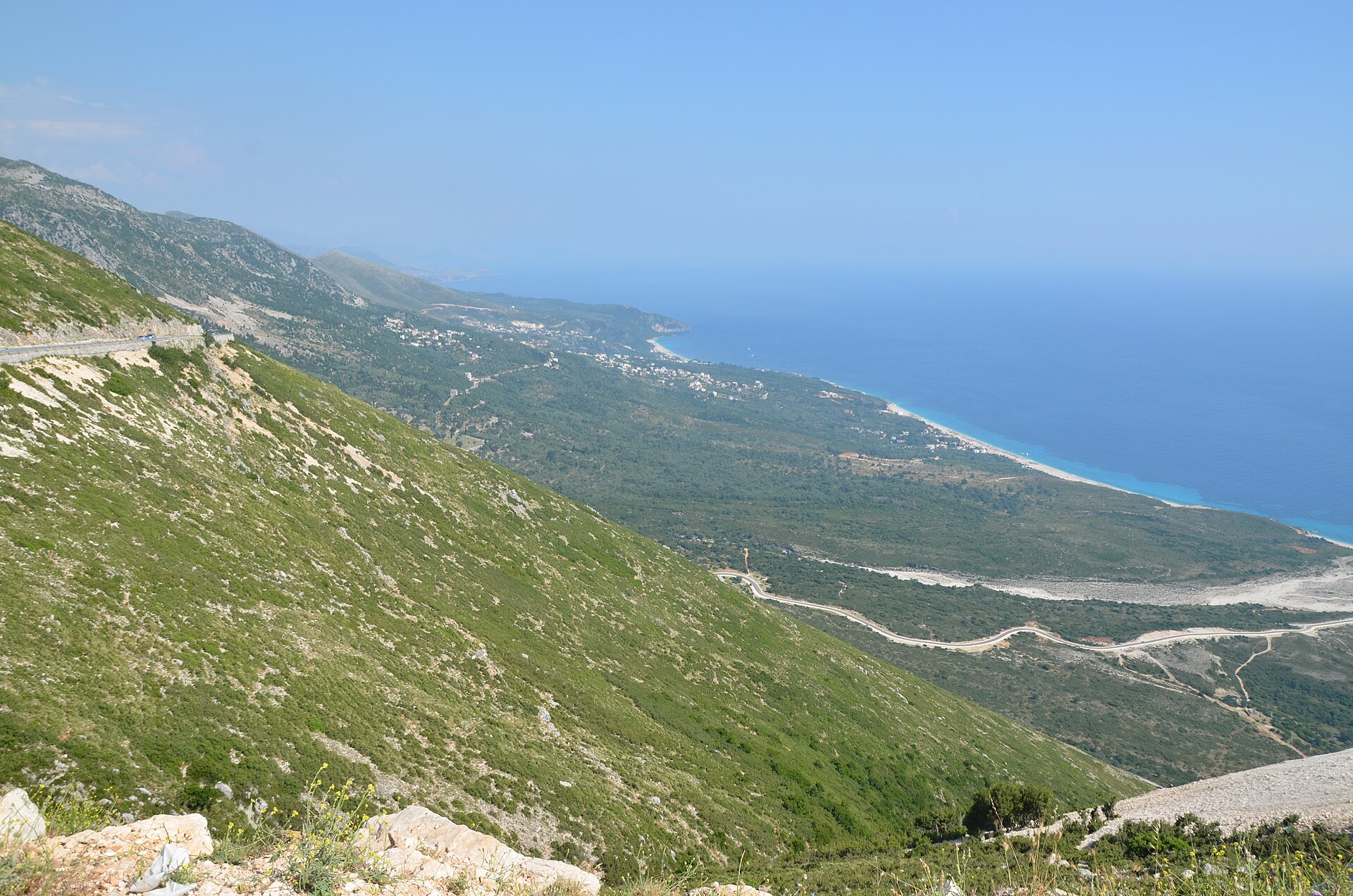Green hills dropping to the Ionian Sea near Dhërmi on the Albanian Riviera
