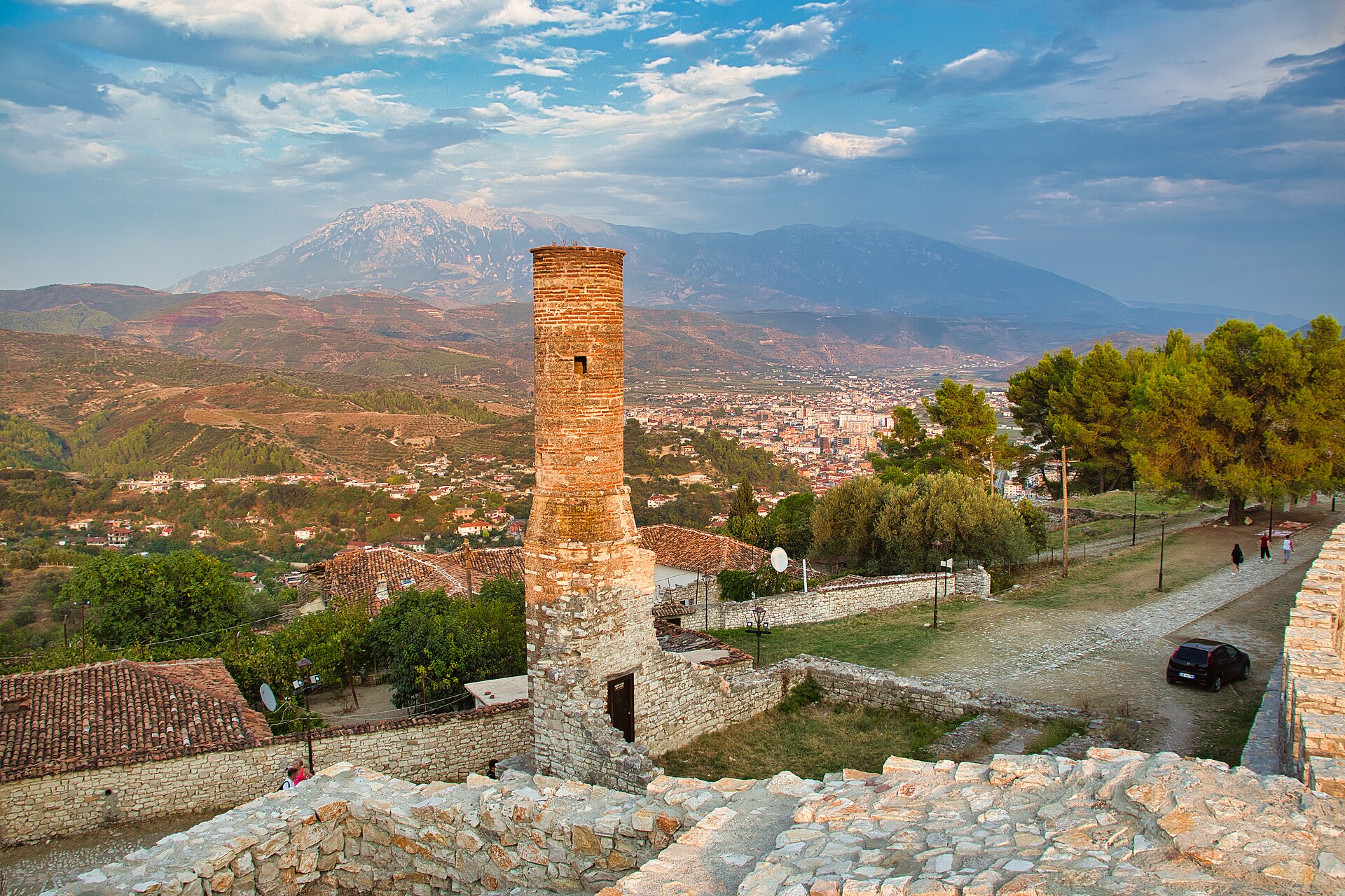 A ruined tower inside Berat Castle, with Mount Tomorr behind